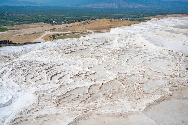 Calcite cliff of Pamukkale, white travertines in Turkey. High quality photo - Фото, зображення