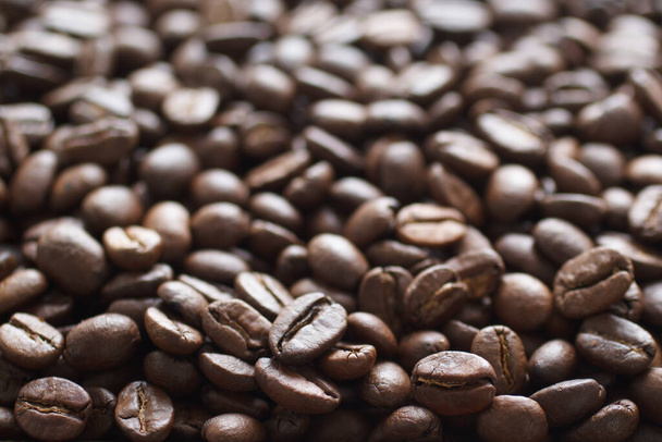 Coffee beans with focus on foreground - Photo, Image