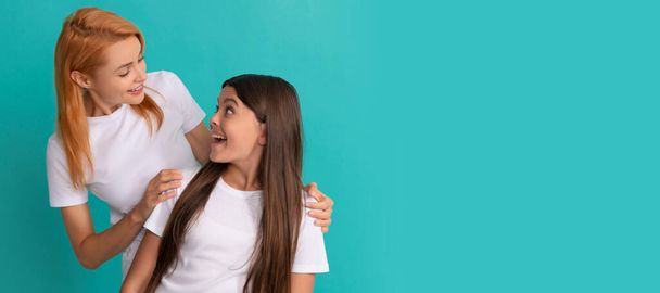 Mother and daughter child banner, copy space, isolated background. express emotions. cheerful mother and daughter. mom and teen girl portrait - Photo, Image