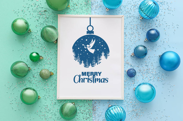Frame with text MERRY CHRISTMAS and decor on color background - Photo, image