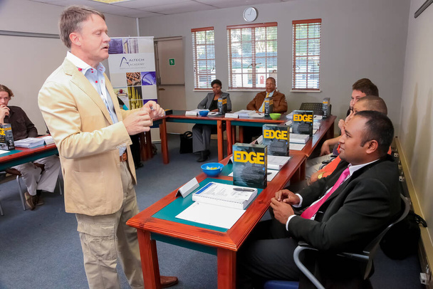 Johannesburg, South Africa - May 7, 2012: Mature students attending a class in College - 写真・画像