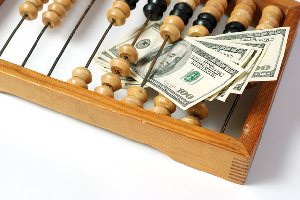 Abacus and dollars - Foto, afbeelding