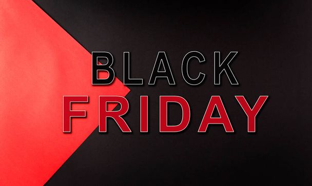 Top view of black and red paper background with the text. Black Friday decoration background concept. - Photo, Image