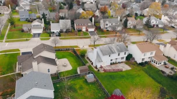 Aerial drone view of American suburban neighborhood. Establishing shot of Americas suburb. Residential single family houses pattern. Autumn Fall season - Footage, Video