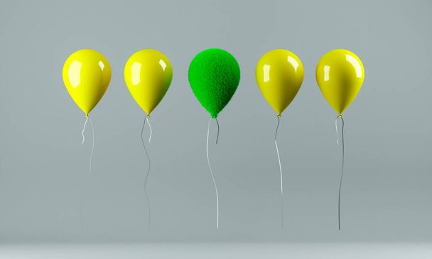 Zielona trawa alternatywny balon wśród żółtych. Brak plastiku, niska koncepcja odpadów - Zdjęcie, obraz