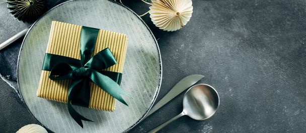 Long banner for design, web site. Christmas Table Setting with gift box on table, cutlery. Christmas dinner, new year party concept. Copy space, top view. - Fotografie, Obrázek