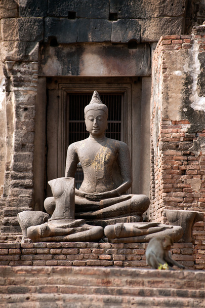 Outdoor ancient Buddha In Phra Prang Sam Yod Temple,Thailand. - Photo, image