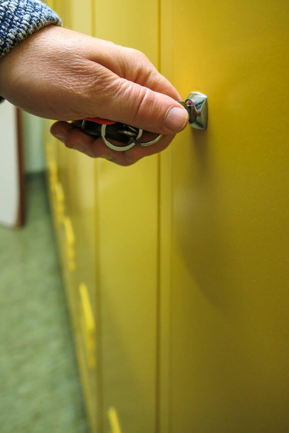 a locker is unlocked with a key - Fotografie, Obrázek