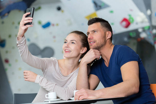 portrait of a happy couple making selfie - Фото, зображення