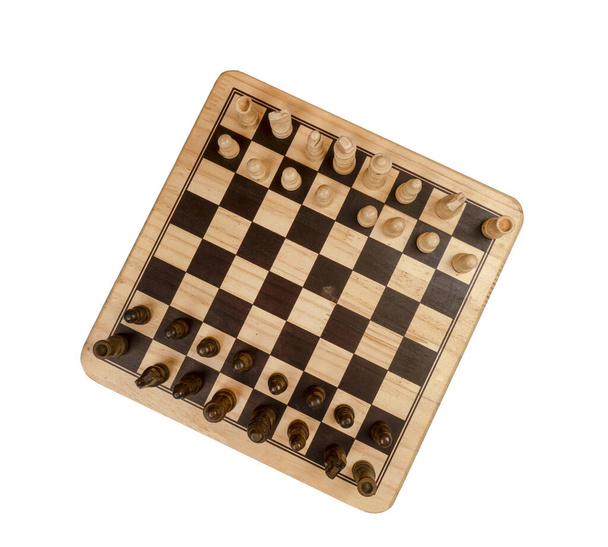 the chess pieces arranged on a chessboard on a transparent surface - Fotoğraf, Görsel