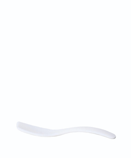 espatula de fesstico color blanco ondulado  - Фото, изображение