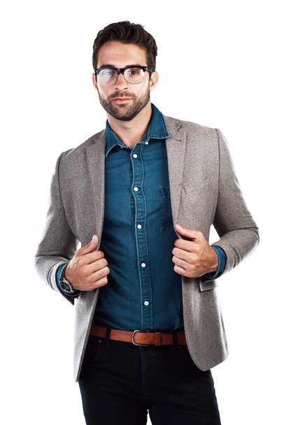 This is how I dress for the office. Studio shot of a handsome young man posing against a white background - Photo, Image