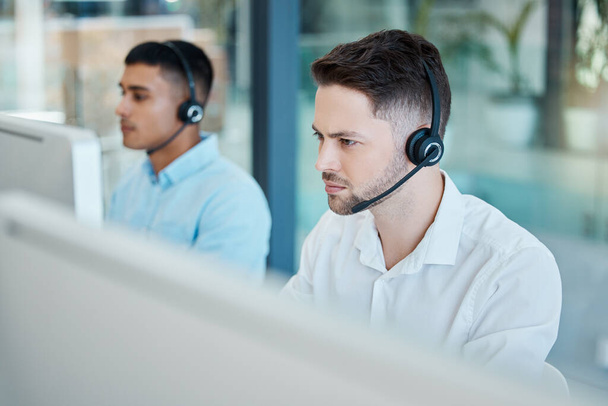 Call center, focused businessman and helping with customer service advice online. Operator, telemarketing and consultant offering digital support using a headset. Hotline agent, contact us and help. - Φωτογραφία, εικόνα