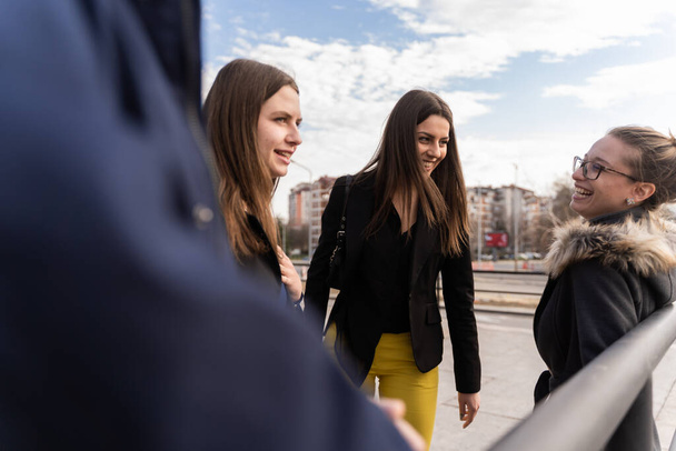 Group of young business people are smiling together - Valokuva, kuva