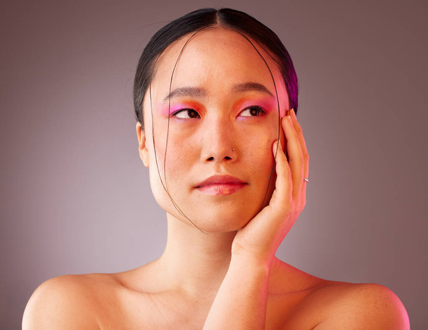 Beauty, skin and face, woman and makeup, facial treatment and skincare, pose in natural cosmetic advertising with studio background. Body care, wellness and glow mockup, Asian model and cosmetology - 写真・画像