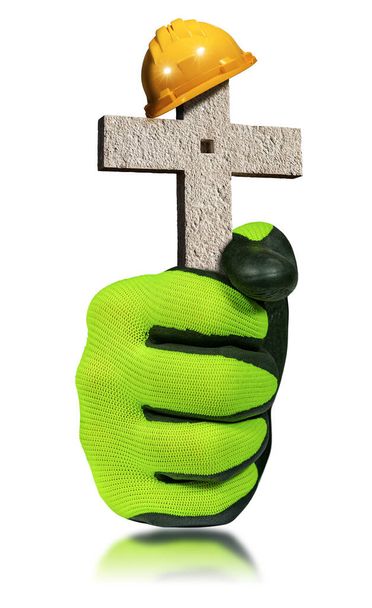 Manual worker with work gloves holding an orange and yellow safety helmet or hard hat on the top of a stone cross, isolated on white background with reflections. Workplace death and accidents concept. - Photo, Image