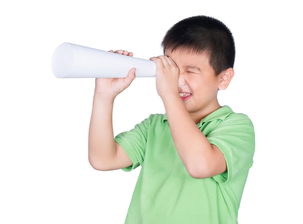 Little boy with a fake megaphone made with white paper isolated on the white background, rights of a child - Foto, Bild