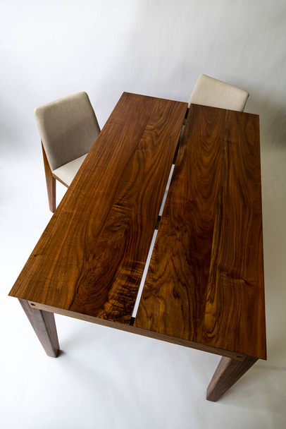 designer wood dining table, minimalist and simple objects on the table, mexico latin america - Foto, afbeelding