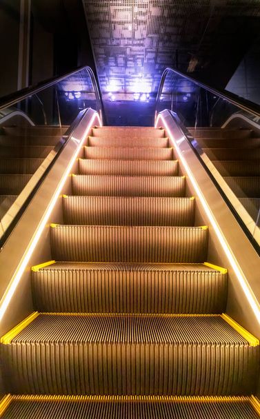 Upstairs escalator at night with lights - Photo, Image