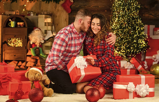 buy presents. Couple in love at Christmas. man and girl gift boxes. romantic couple have fun. too much xmas presents. Two lovers hugging in Saint Valentines Day. Enjoying new year together. - Foto, Bild