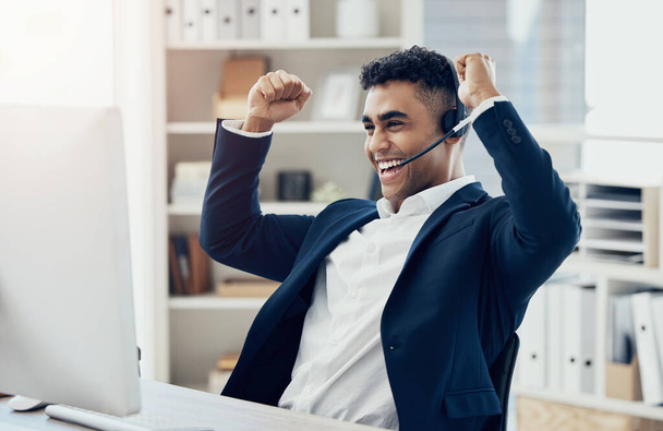 Businessman, fist or success on call center computer in sales deal, target goals or b2b consulting help. Happy smile, celebration telemarketing receptionist and winner expression in contact us office. - Fotó, kép