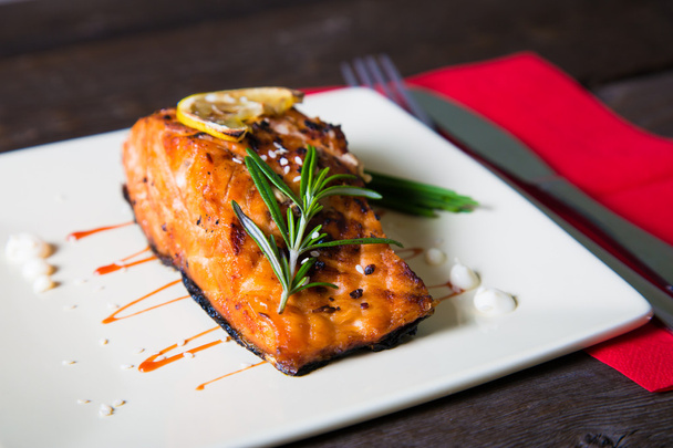 Salmon fillet with lemon and rosemary - Photo, Image