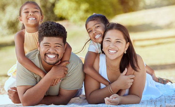 Happy family, hug and portrait smile for relax, quality bonding time or summer vacation together in the outdoors. Mother, father and children smiling in happiness for freedom, relationship and nature. - Foto, Imagen