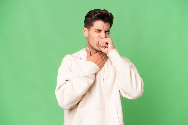 Young caucasian handsome man over isolated background coughing a lot - Photo, Image