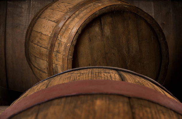 background of barrel and worn old table of wood. High quality photo - 写真・画像