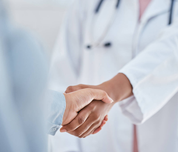 Handshake, trust and thank you with patient and doctor or medical worker shaking hands, greeting or introduction during consultation. People hand welcome gesture or welcome, partnership or help. - Photo, Image