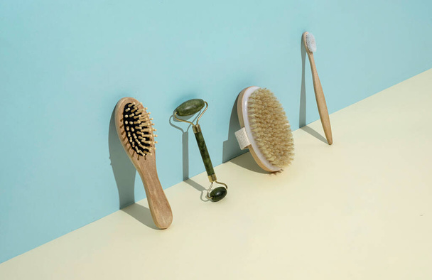 Sustainable career eco accessories brushes for self care and body care. Minimal trend health concept. High quality photo - Fotó, kép