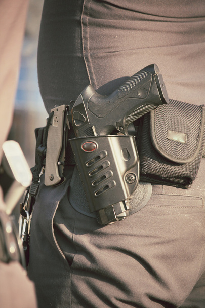 Полицейский с пистолетом
 - Фото, изображение