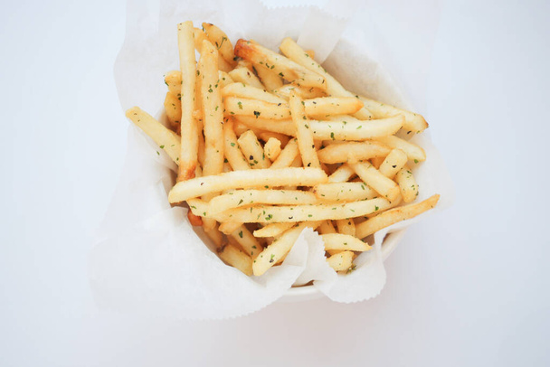overhead shot of French Fries on white background , - Foto, imagen