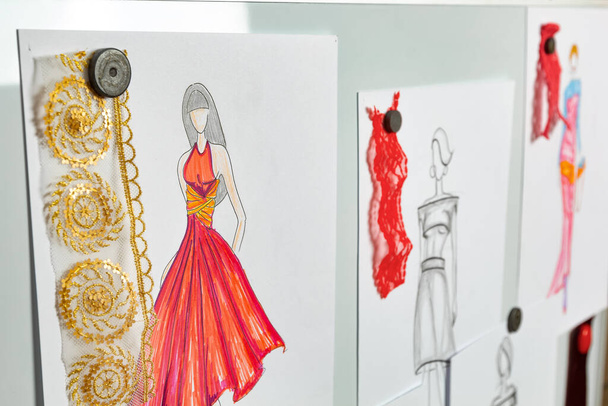 Designer clothing sketched for a tailor. Drawings of women's dresses. - Photo, Image