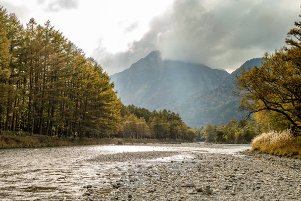 Azusa river flows through Kamikochi, into the Matsumoto Basin. The river itself flows from a spring located deep within Mt. Yari, perhaps the most famed peak in the Northern Alps. - 写真・画像