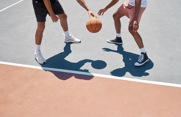 Men, exercise and basketball training, sport and game with basketball player on a court outdoor in summer. Healthy sports people or athlete, workout and fitness people practice for match with ball. - Photo, Image