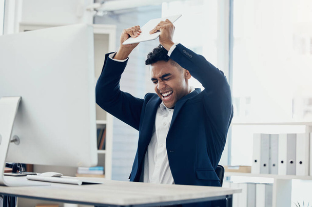 Angry, stress and businessman breaking technology in digital marketing office, advertising startup or company after 404 glitch. Mad, shouting or aggressive worker smashing tablet in rage from mistake. - Foto, Bild