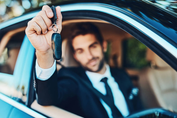 The keys to success. a handsome young corporate businessman holding car keys - Foto, immagini