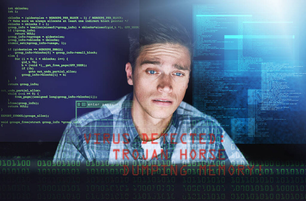 Este vírus foi concebido para distrair da ameaça real. um bonito jovem hacker masculino no trabalho - Foto, Imagem