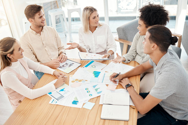 Documents, graphs and business people in meeting for analysis, talking and planning. Teamwork, strategy and group in discussion, speaking and working on infographics, analytics and financial report. - Foto, Imagem