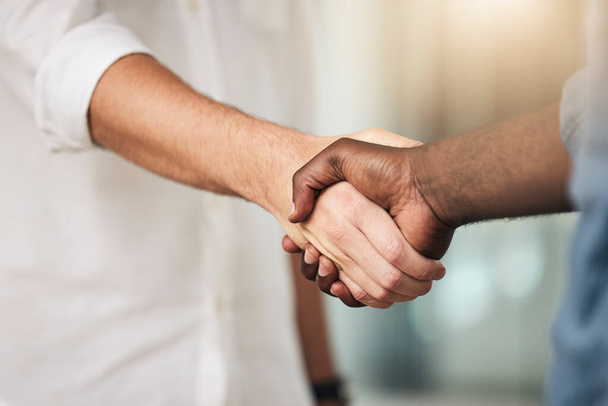 Business, handshake and partnership for deal, agreement or commitment in collaboration at the office. Hands of people shaking for meeting, b2b or greeting in teamwork, care and support at workplace. - Foto, afbeelding