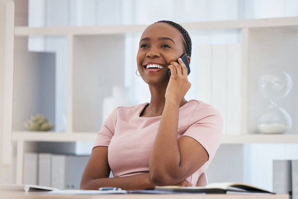 Black woman, smartphone and talking business project, smile and happy for approval, speaking and in workplace. Female employee, happiness and on phone call for communication, plan schedule and chat - Fotografie, Obrázek
