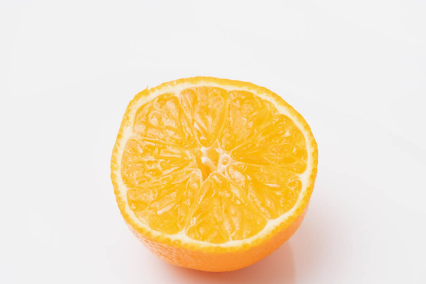 Ripe tangerine on white background - Fotografie, Obrázek