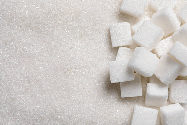 Refined and granulated white sugar as background, closeup - Photo, image