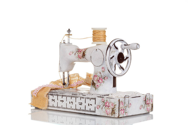decorative sewing machine on a white background close-up - Photo, Image