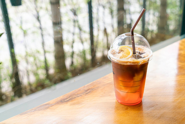 espresso coffee shot with lemon peach soda glass in coffee shop cafe - Foto, Imagem