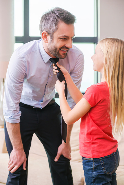 Girl helping father to tie necktie - Photo, image
