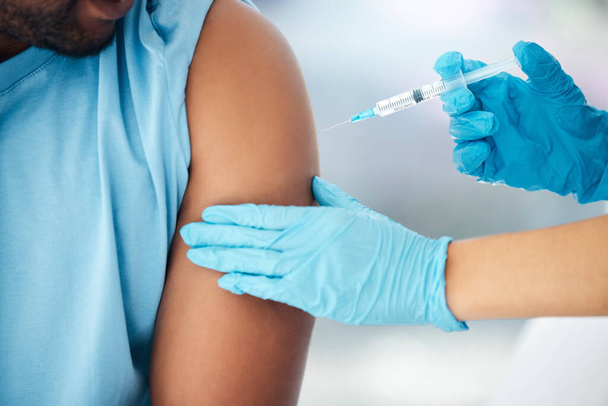 Covid vaccine, doctor hands with patient medical injection zoom in hospital or clinic for safety, compliance and insurance. Trust, expert and healthcare worker with corona virus vaccination medicine. - Фото, зображення