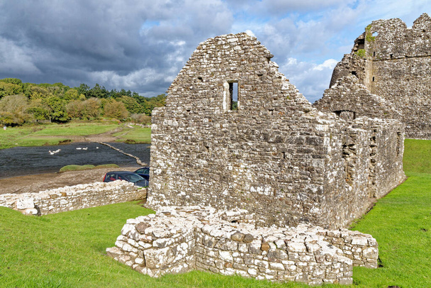 Ruins of Ogmore Castle in Vale of Glamorgan river. Ogmore by Sea, Glamorgan, Wales, United Kingdom - Photo, Image