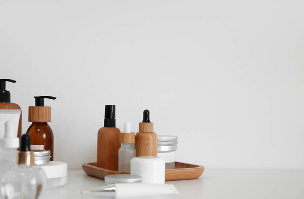 Set of different cosmetic products on light background - Fotografie, Obrázek